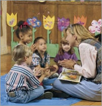 picture of a teacher and some kids sitting in a circle at church